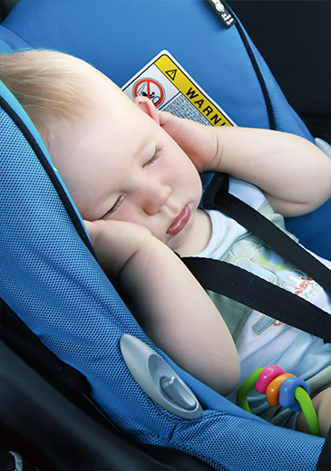 Baby in a car seat (photo)