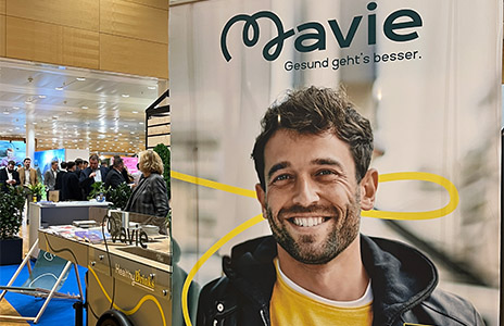mavie poster at an event (Photo)